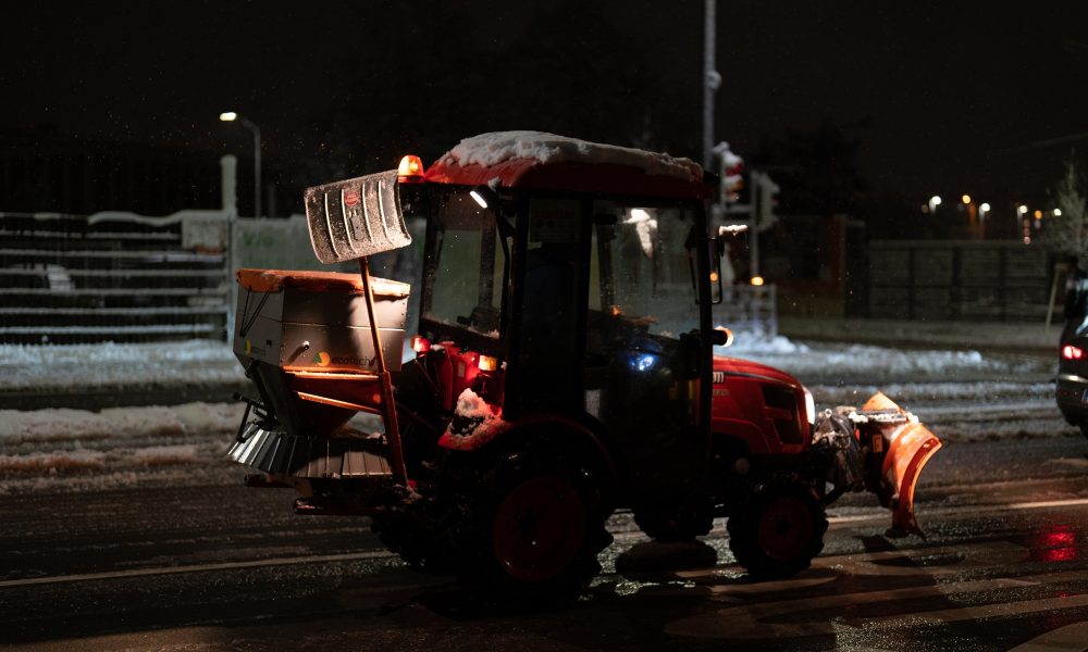 Winter service clears snow from the street