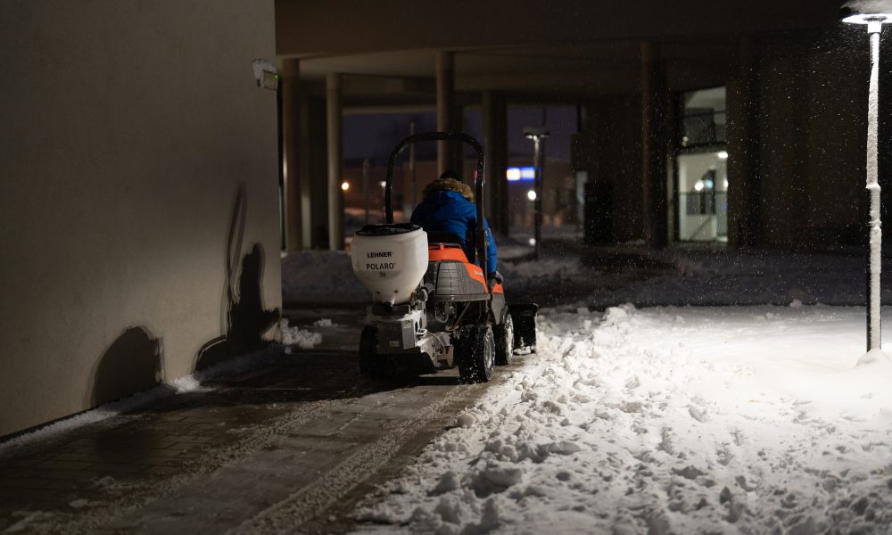Winter service clears snow from the street